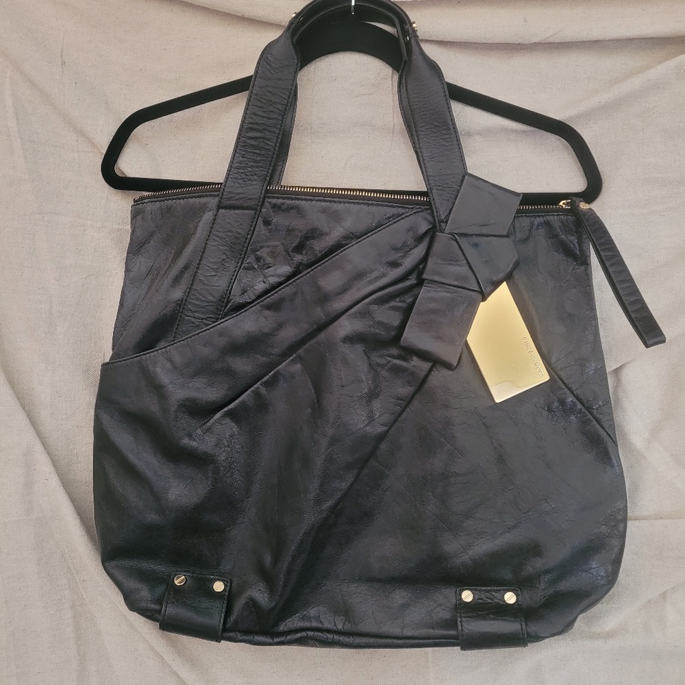 Leather HOBO purse. Material lined brass hardware, soft leather, Minimal use.
